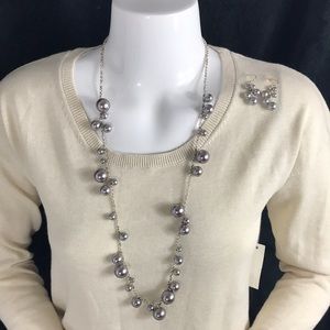Silver tone necklace and earrings set